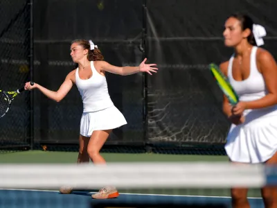 Cedar Rapids Xavier's Tia Halabi, left, and Gemma Younadam, right, won the Class 1A doubles state championship in Iowa City on Oct. 2.