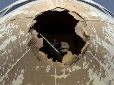 Damage to nose of Delta Air Lines aircraft from flying into hail in 2023, according to Italian accident report. - ANSV