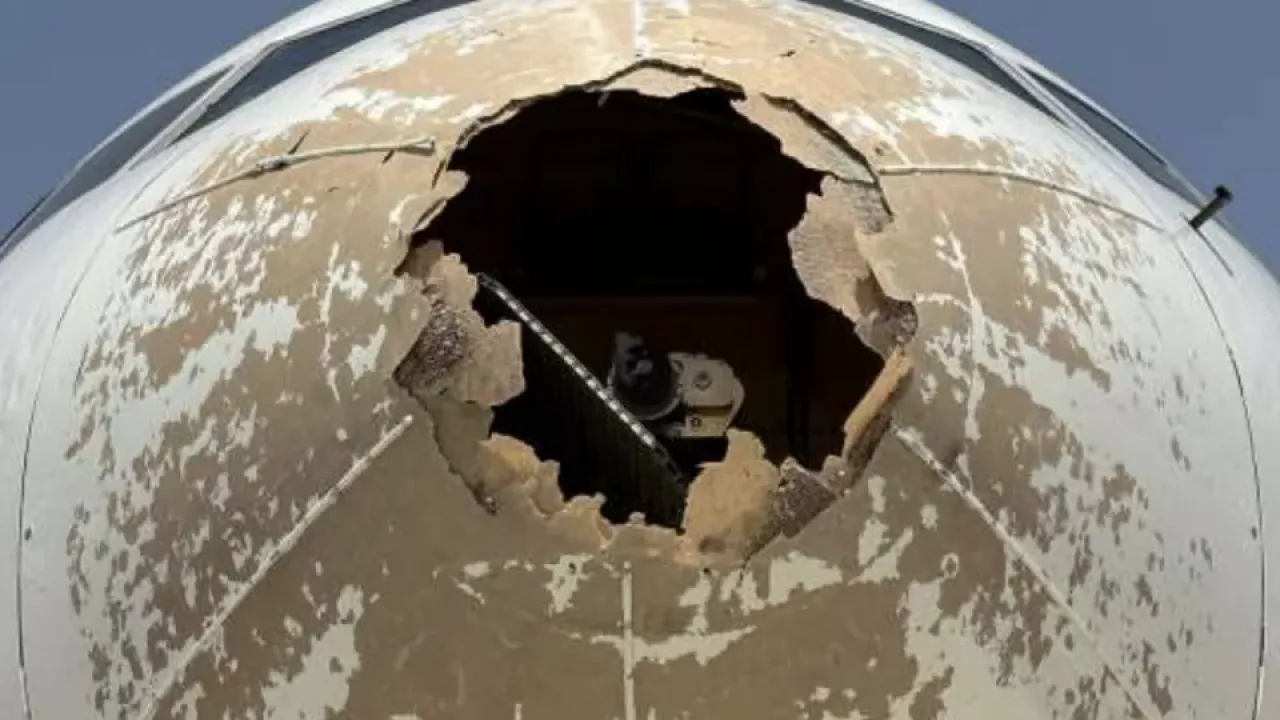 Damage to nose of Delta Air Lines aircraft from flying into hail in 2023, according to Italian accident report. - ANSV