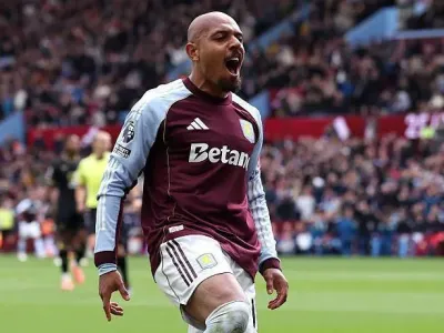 Donyell Malen celebrates after scoring for Aston Villa against Burnley in the Premier League