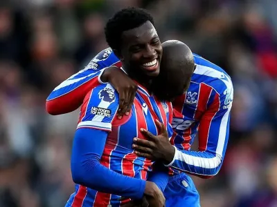 Eddie Nketiah celebrates scoring his team&#39;s second goal with teammate Jean-Philippe Mateta 