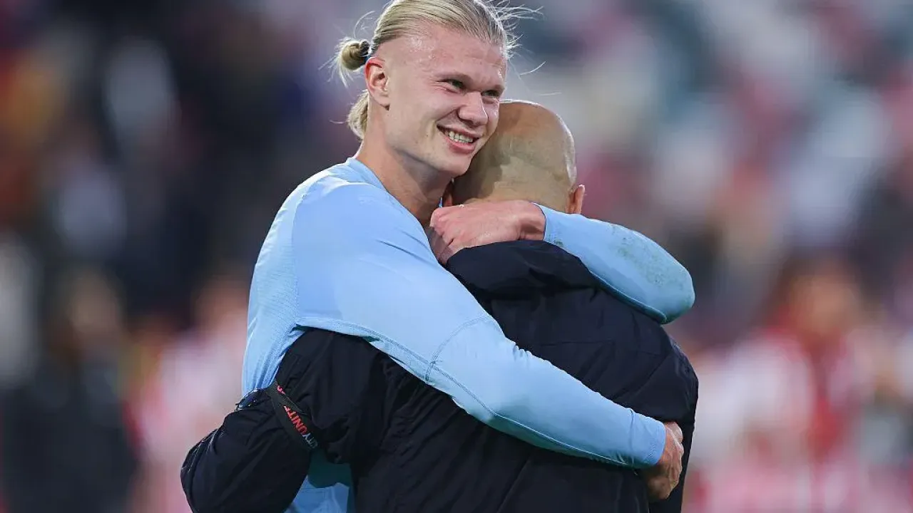 Erling Haaland hugs Pep Guardiola after win over Brentford in Premier League