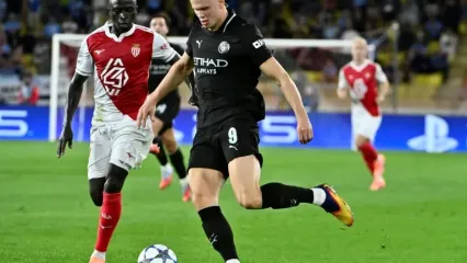 Erling Haaland scored twice but Manchester City had to settle for a 2-2 draw at Monaco in the Champions League on Wednesday (FREDERIC DIDES)