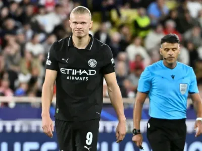 Erling Haaland scored twice in Man City's 2-2 draw at Monaco (FREDERIC DIDES)