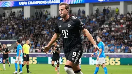 Harry Kane celebrates after scoring for Bayern Munich