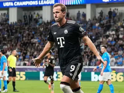 Harry Kane celebrates after scoring for Bayern Munich