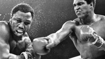 In their third clash, Muhammad Ali (right) secured a TKO to go 2-1 against Joe Frazier (AP)