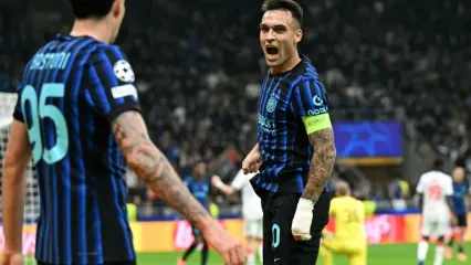 Lautaro Martinez celebrates scoring Inter Milan's third goal against Slavia Prague (Stefano RELLANDINI)