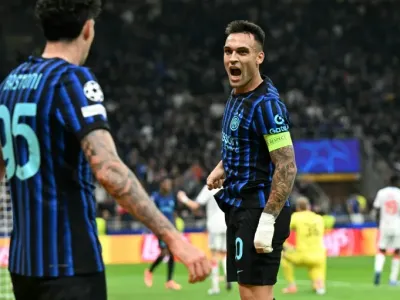 Lautaro Martinez celebrates scoring Inter Milan's third goal against Slavia Prague (Stefano RELLANDINI)