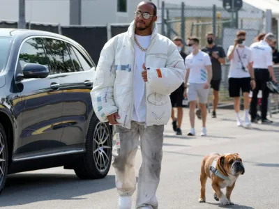 Lewis Hamilton with Roscoe at Monza racetrack