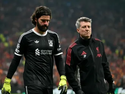 Liverpool goalkeeper Alisson Becker will miss the trip to Chelsea with a hamstring injury (Ozan KOSE)