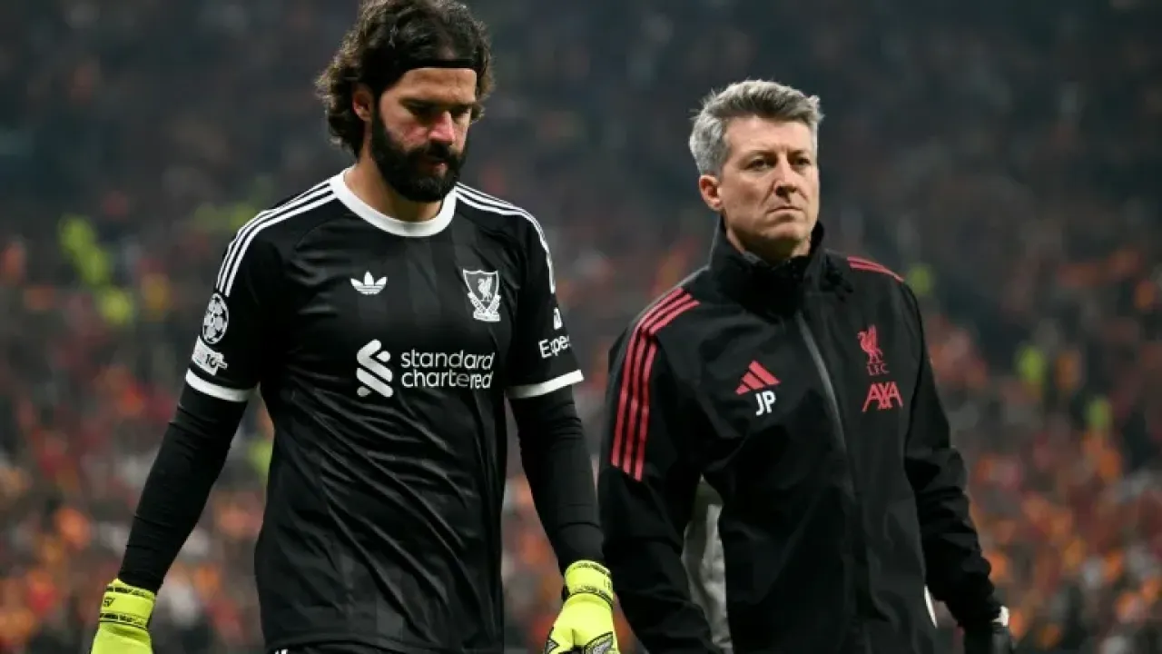 Liverpool goalkeeper Alisson Becker will miss the trip to Chelsea with a hamstring injury (Ozan KOSE)