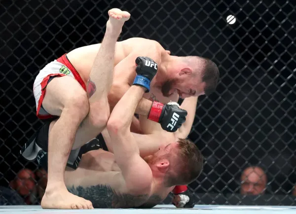 Merab Dvalishvili (above) outpointed Cory Sandhagen to keep his bantamweight belt (Getty Images)