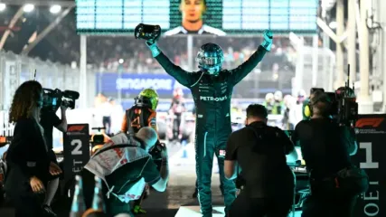 Mercedes driver George Russell celebrates his victory in the Singapore Grand Prix (MOHD RASFAN)