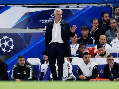 Mourinho was handed a yellow as Benfica protested a second-half decision which went against them (Action Images via Reuters)