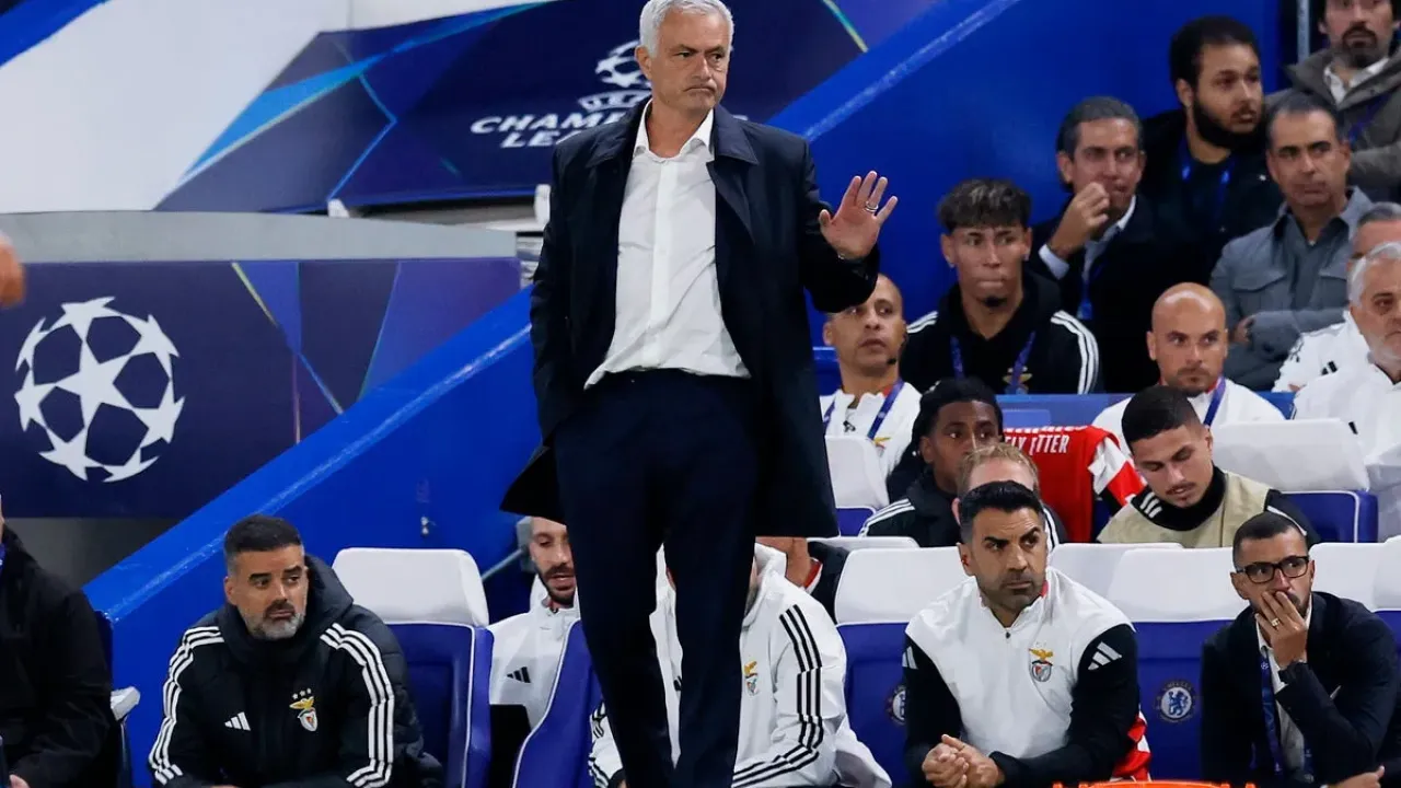 Mourinho was handed a yellow as Benfica protested a second-half decision which went against them (Action Images via Reuters)