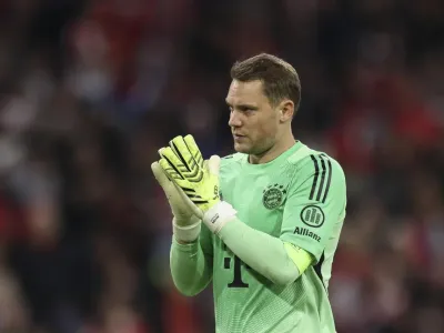 Neuer pulls level with ex-Bayern teammate M&#xfc;ller for record of most Bundesliga wins