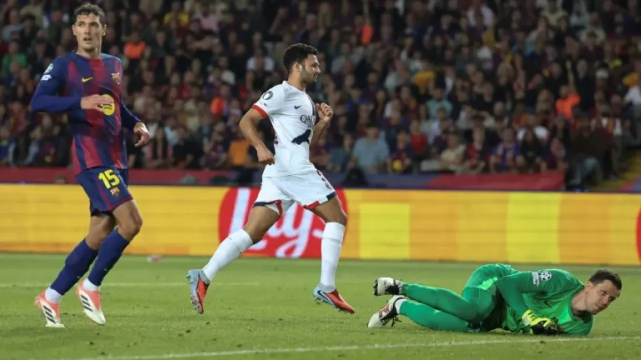 Paris Saint-Germain's Portuguese forward Goncalo Ramos scores their winner against Barcelona in an entertaining Champions League clash (Josep LAGO)