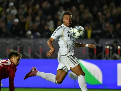 Real Madrid's French forward Kylian Mbappe netted a hat-trick against Kairat on Tuesday in the Champions League (Vyacheslav OSELEDKO)