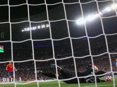 Spain&#39;s Cesc Fabregas scores in the Donbass Arena