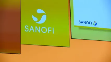 The logo of the French drug manufacturer Sanofi, taken during a general meeting of the pharmaceutical company. Eric Piermont/AFP/dpa