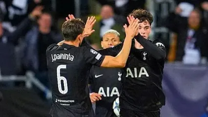 Tottenham celebrate scoring a last-minute equaliser