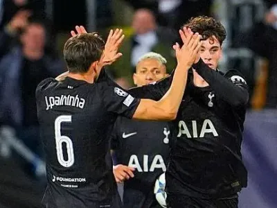 Tottenham celebrate scoring a last-minute equaliser