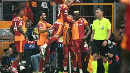 Victor Osimhen celebrates with teammates after scoring for Galatasaray in their win against Liverpool (Ozan KOSE)